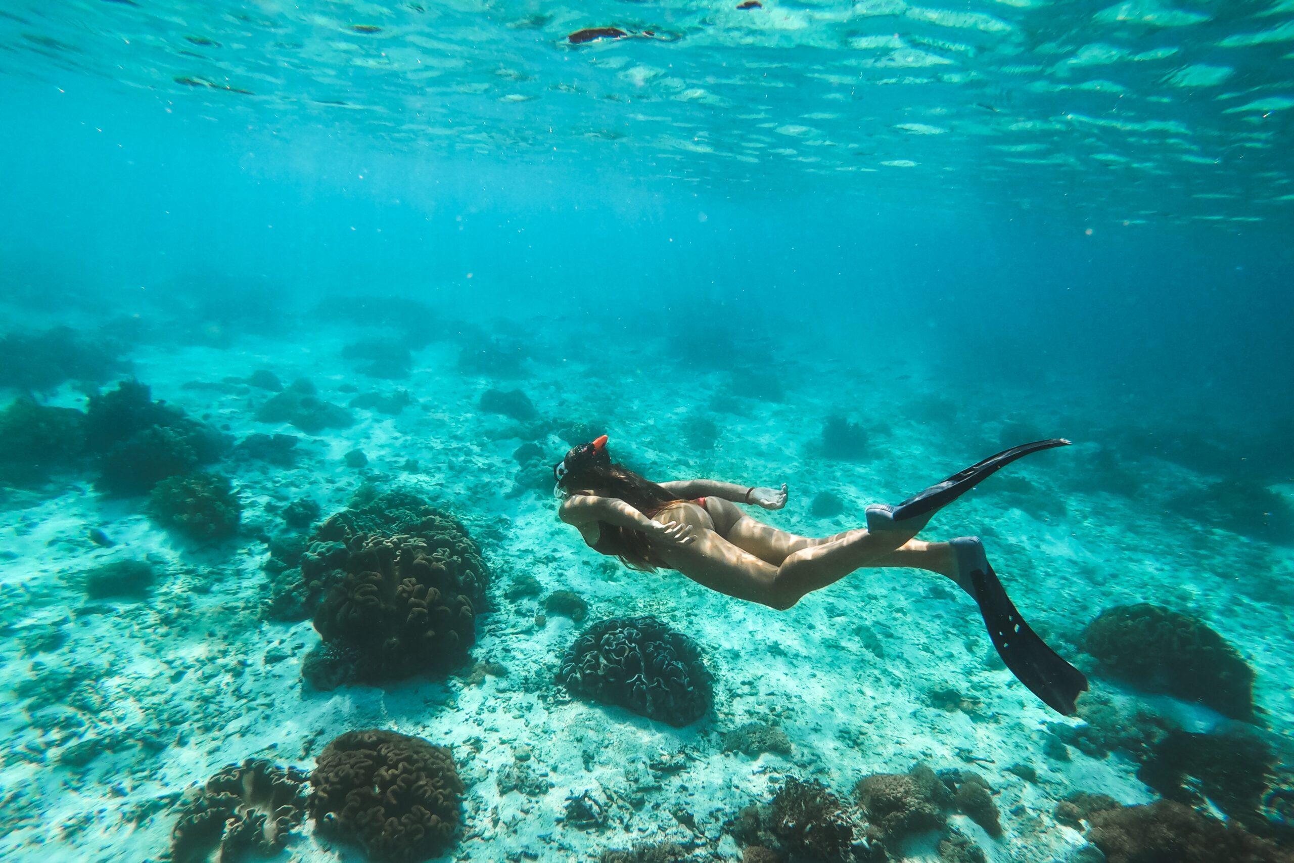 woman snorkeling in the ocean