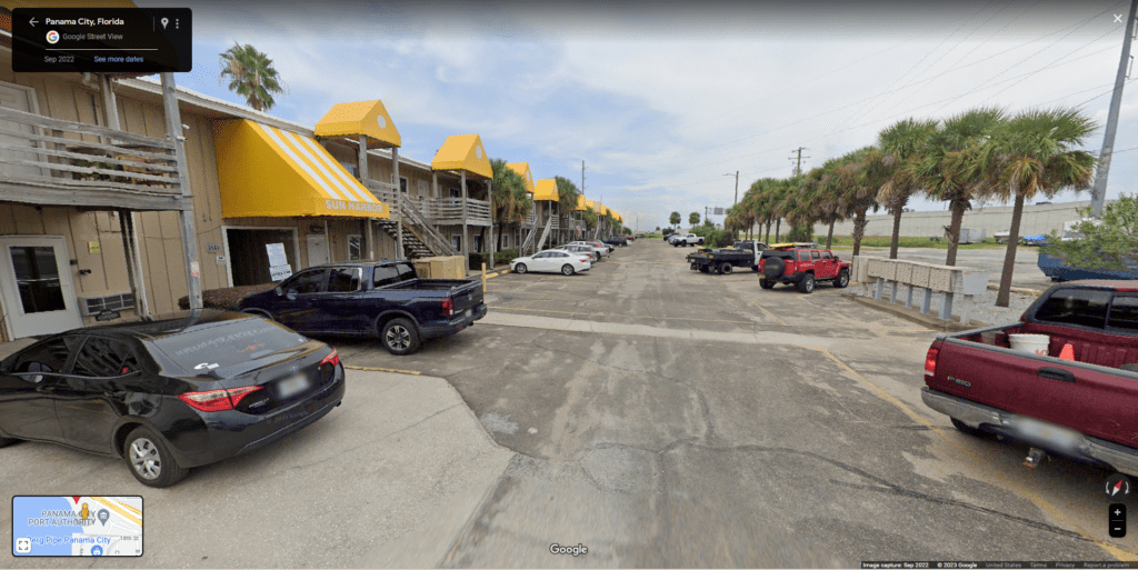 Sun Harbor parking lot view 1